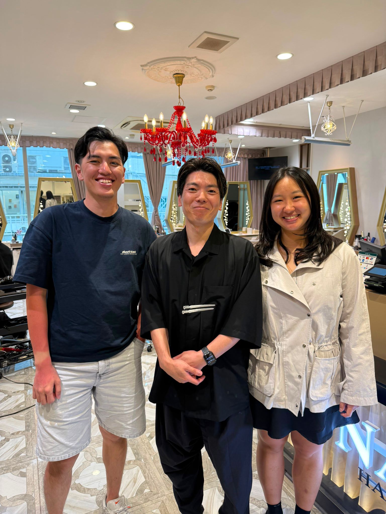 Sons of a longtime Singapore client visiting Kenji for a haircut at his Ginza salon in Tokyo